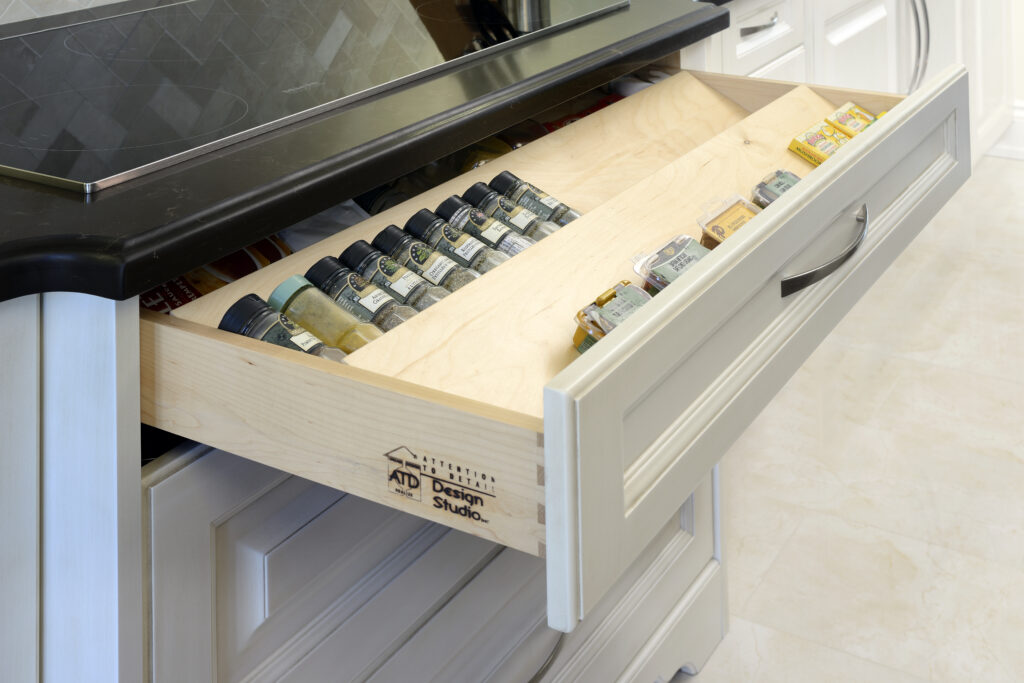 traditional kitchen, fireplace, spice rack, drawer pegs, leaded glass, spice drawer