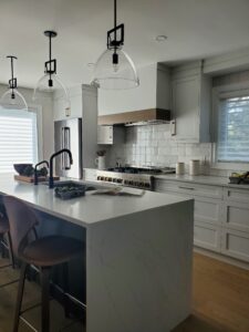 kitchen, union lighting, restoration hardware, brizo, 42&quot; range, jennair, island seating, mid century modern seating, black island, natural light, modern hood